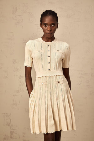 Aurohaya Amélie neutrals pointelle-trim pleated knit mini dress