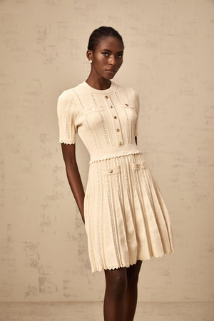 Aurohaya Amélie neutrals pointelle-trim pleated knit mini dress