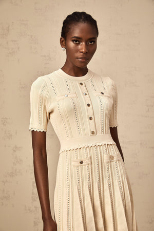 Aurohaya Amélie neutrals pointelle-trim pleated knit mini dress