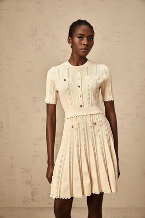 Aurohaya Amélie neutrals pointelle-trim pleated knit mini dress