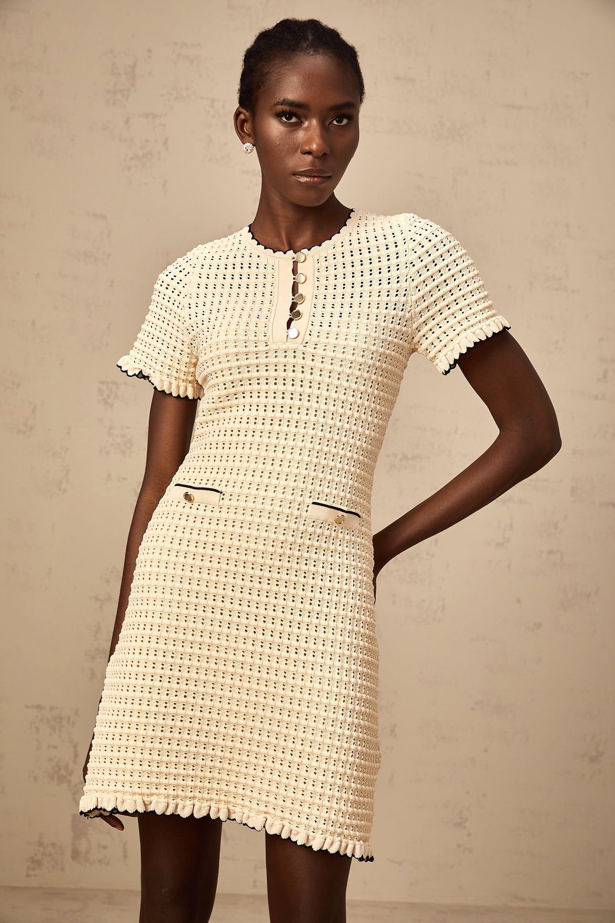 Aurohaya Victoire neutrals ruffled pointelle-knit mini dress