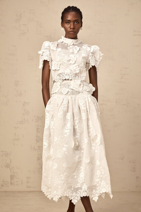 Aurohaya Thérèse white flower-embroidered top & skirt matching set