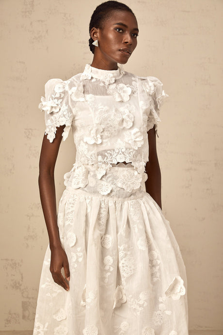 Aurohaya Thérèse white flower-embroidered top & skirt matching set