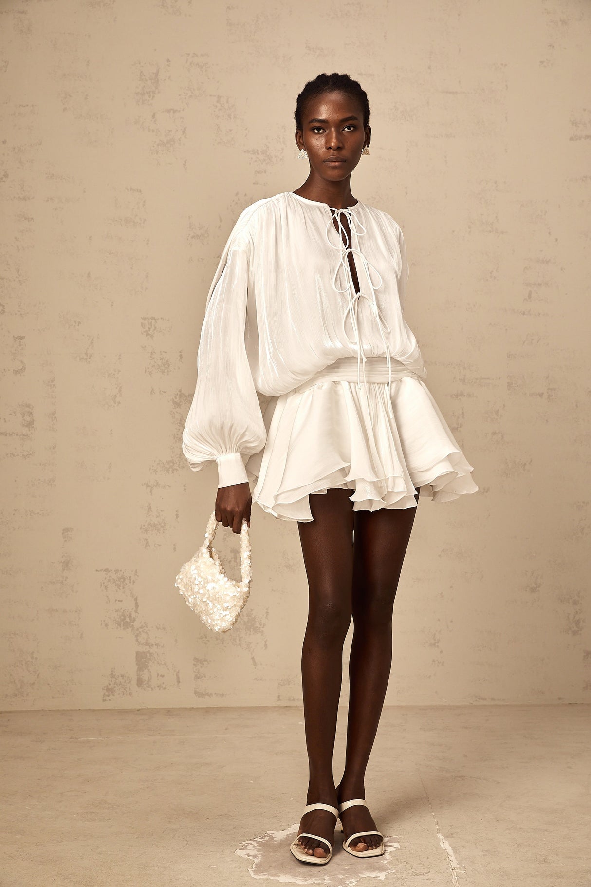 Aurohaya Mahault white pleated glitter-effect mini dress