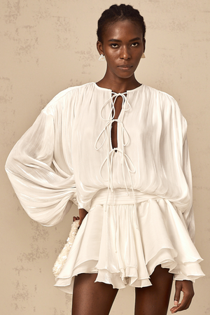 Aurohaya Mahault white pleated glitter-effect mini dress
