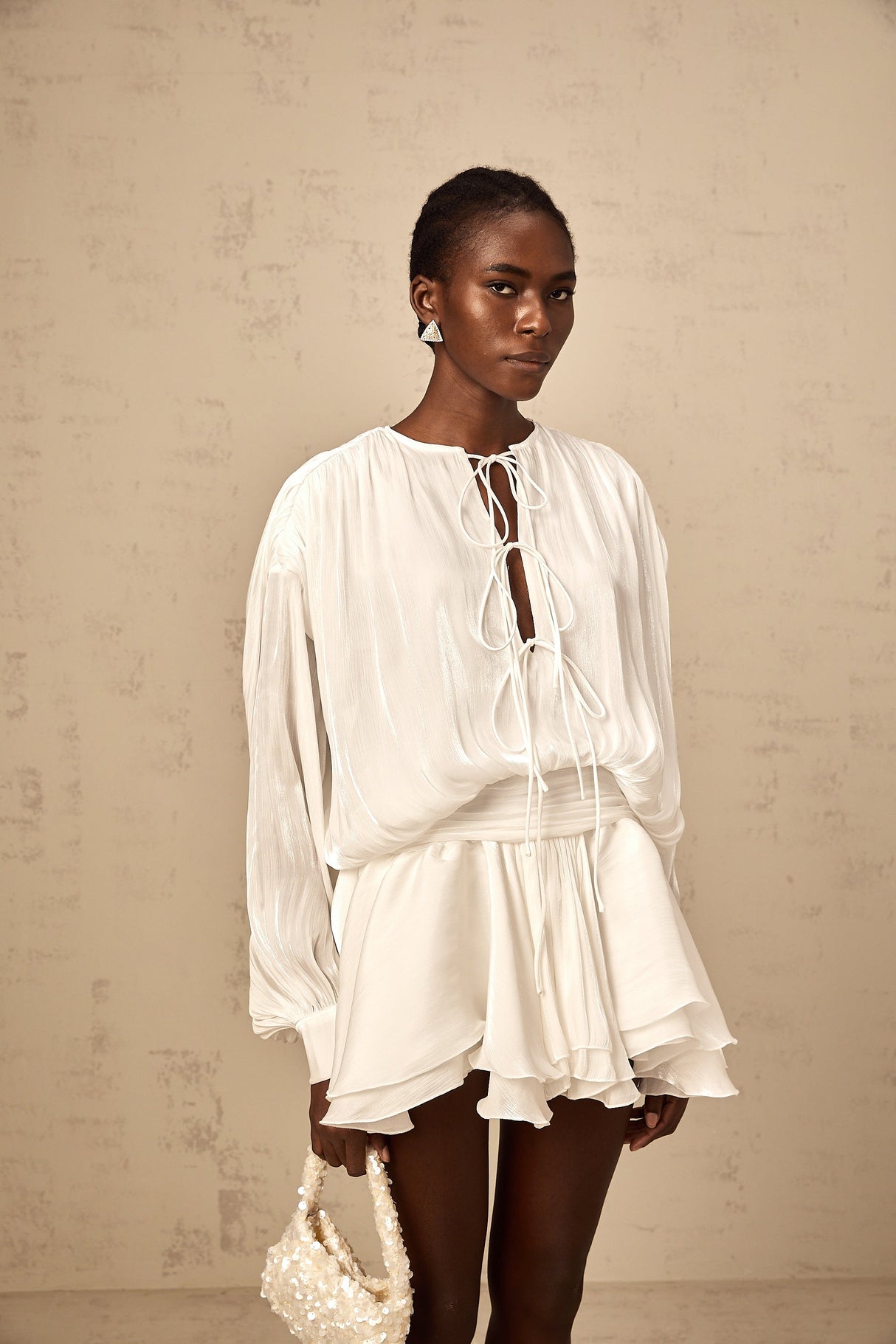 Aurohaya Mahault white pleated glitter-effect mini dress