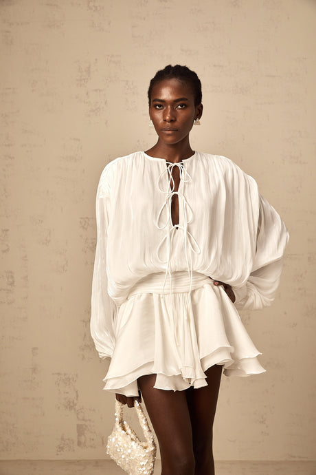 Aurohaya Mahault white pleated glitter-effect mini dress
