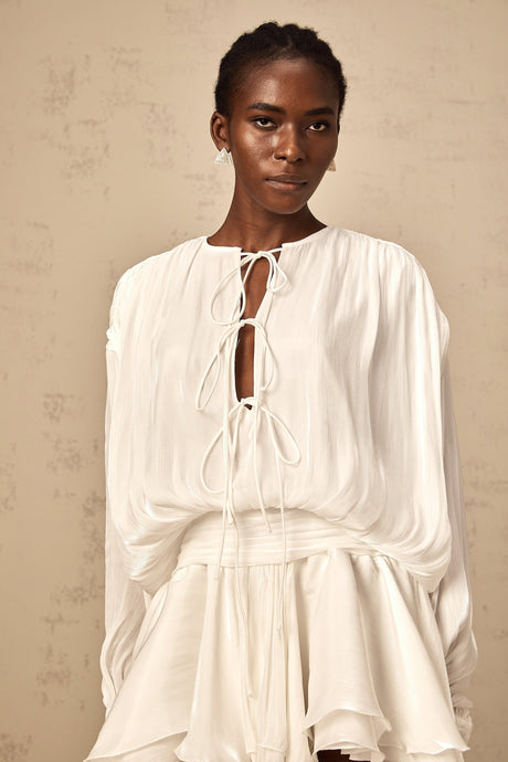 Aurohaya Mahault white pleated glitter-effect mini dress
