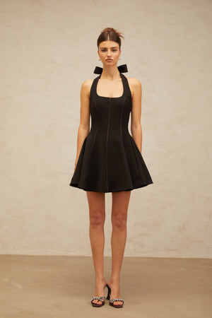 Aurohaya Quirine halterneck bow-detail mini dress in Black