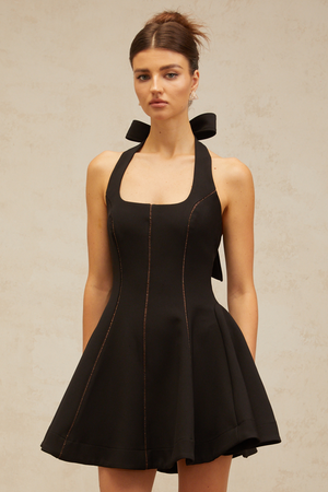 Aurohaya Quirine halterneck bow-detail mini dress in Black