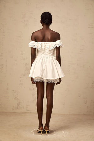 Aurohaya Arsène white oversize-bow ruffled mini dress