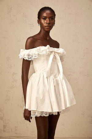 Aurohaya Arsène white oversize-bow ruffled mini dress