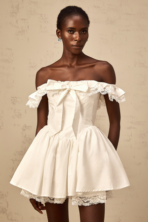 Aurohaya Arsène white oversize-bow ruffled mini dress