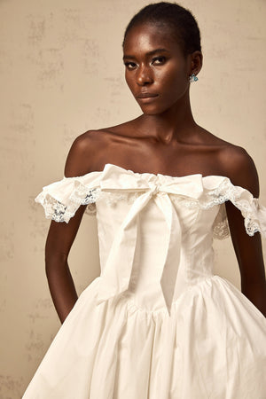 Aurohaya Arsène white oversize-bow ruffled mini dress