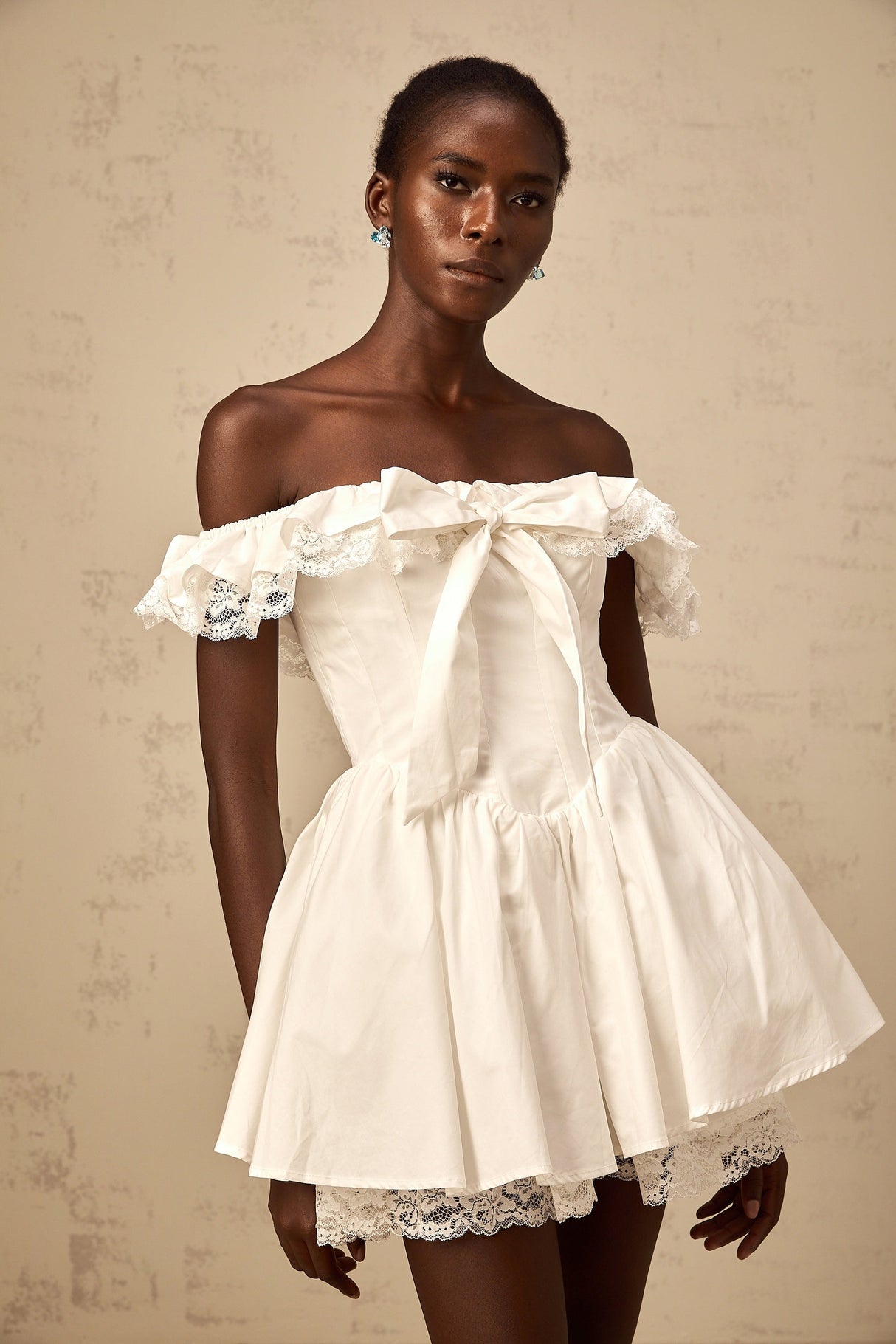 Aurohaya Arsène white oversize-bow ruffled mini dress