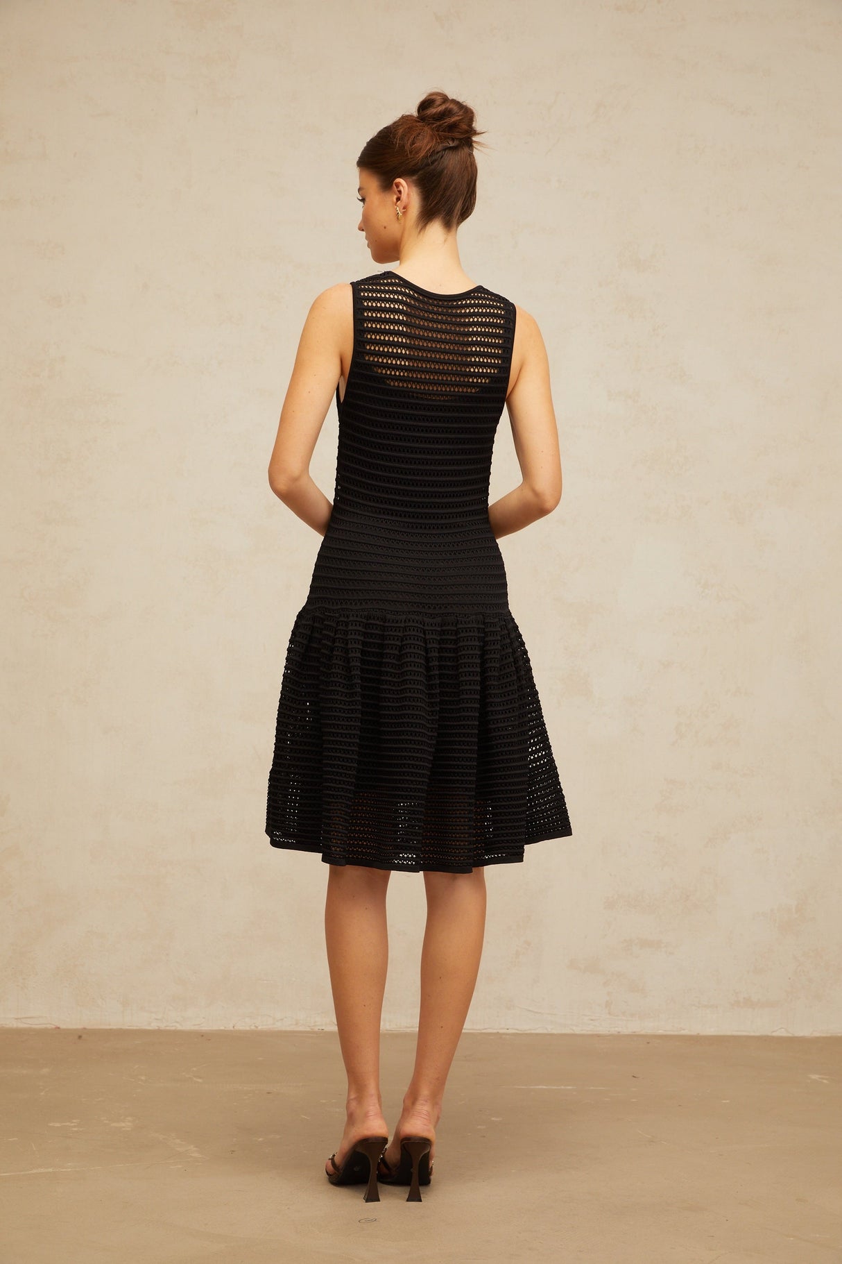 Aurohaya Maelle black flounced pointelle-knit mini dress