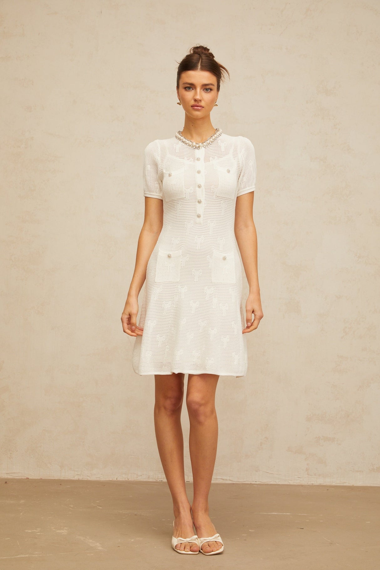 Aurohaya Marjolaine white embellished crochet-knit mini dress