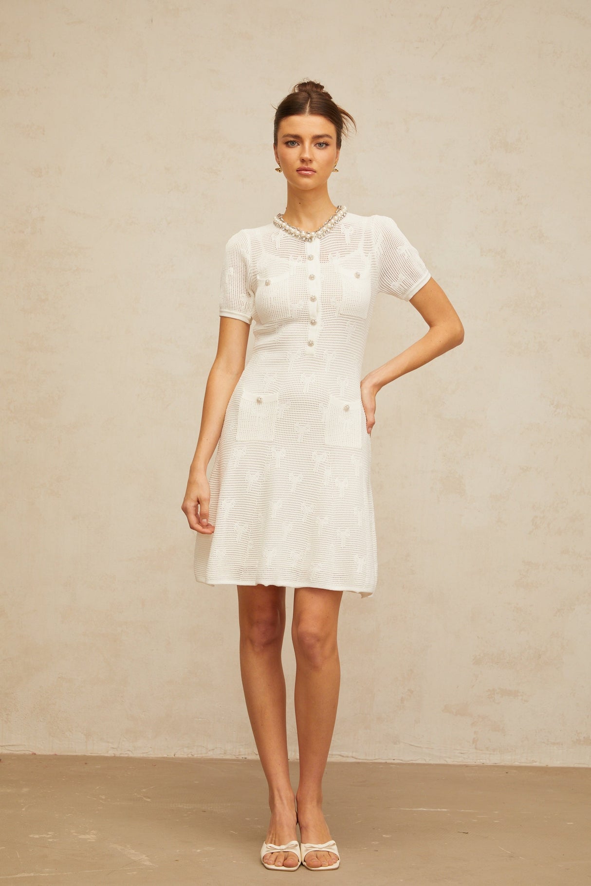 Aurohaya Marjolaine white embellished crochet-knit mini dress
