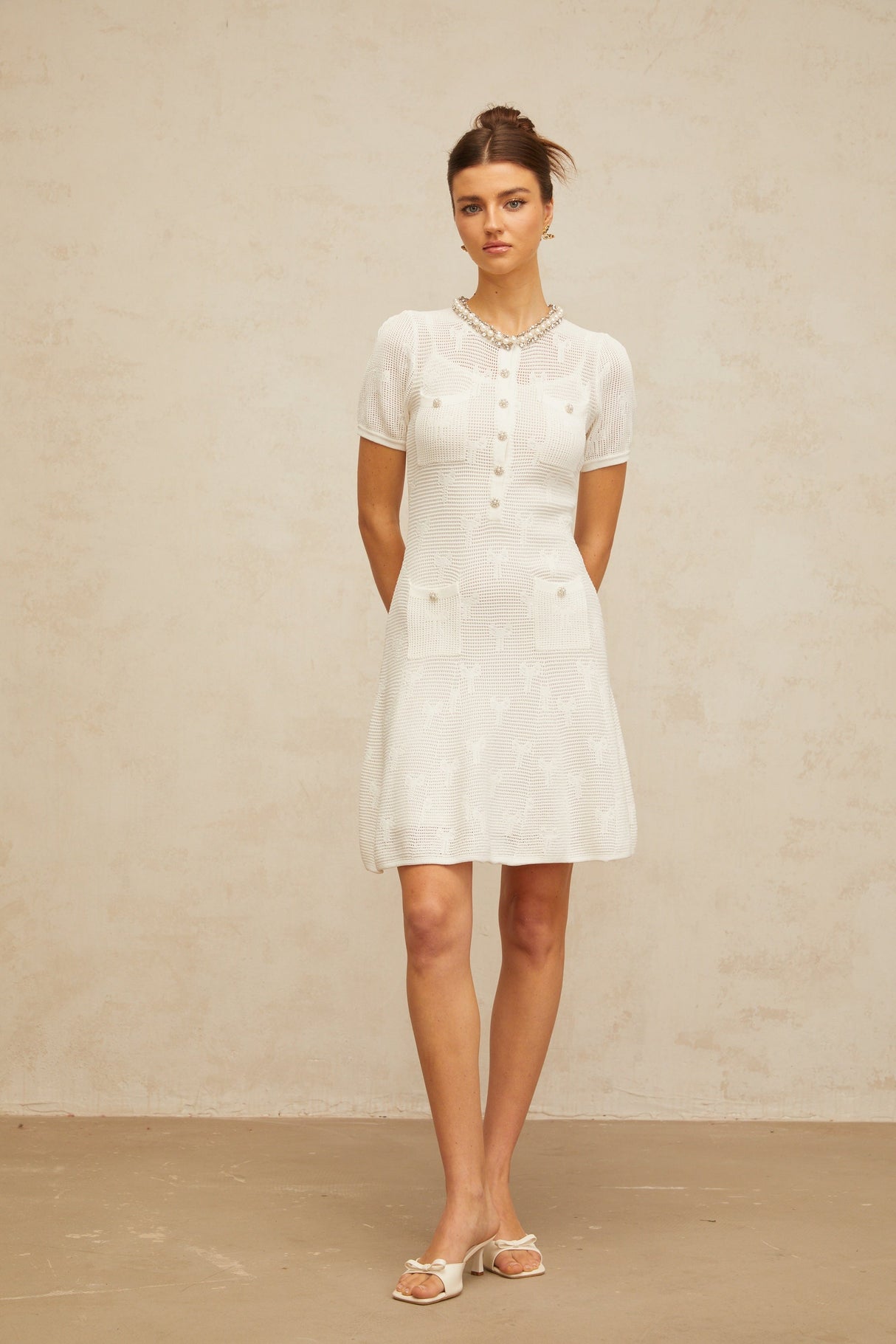 Aurohaya Marjolaine white embellished crochet-knit mini dress