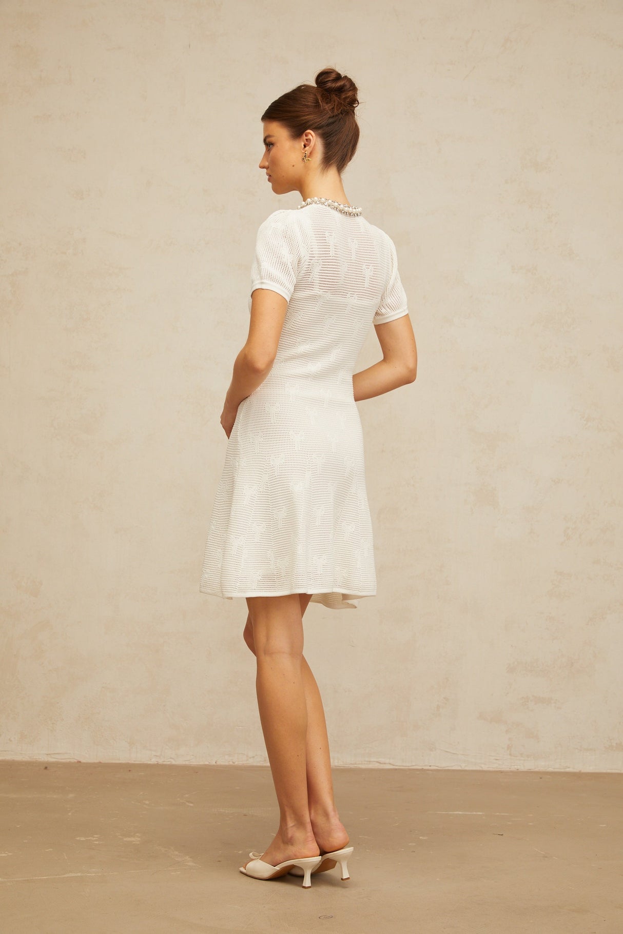 Aurohaya Marjolaine white embellished crochet-knit mini dress