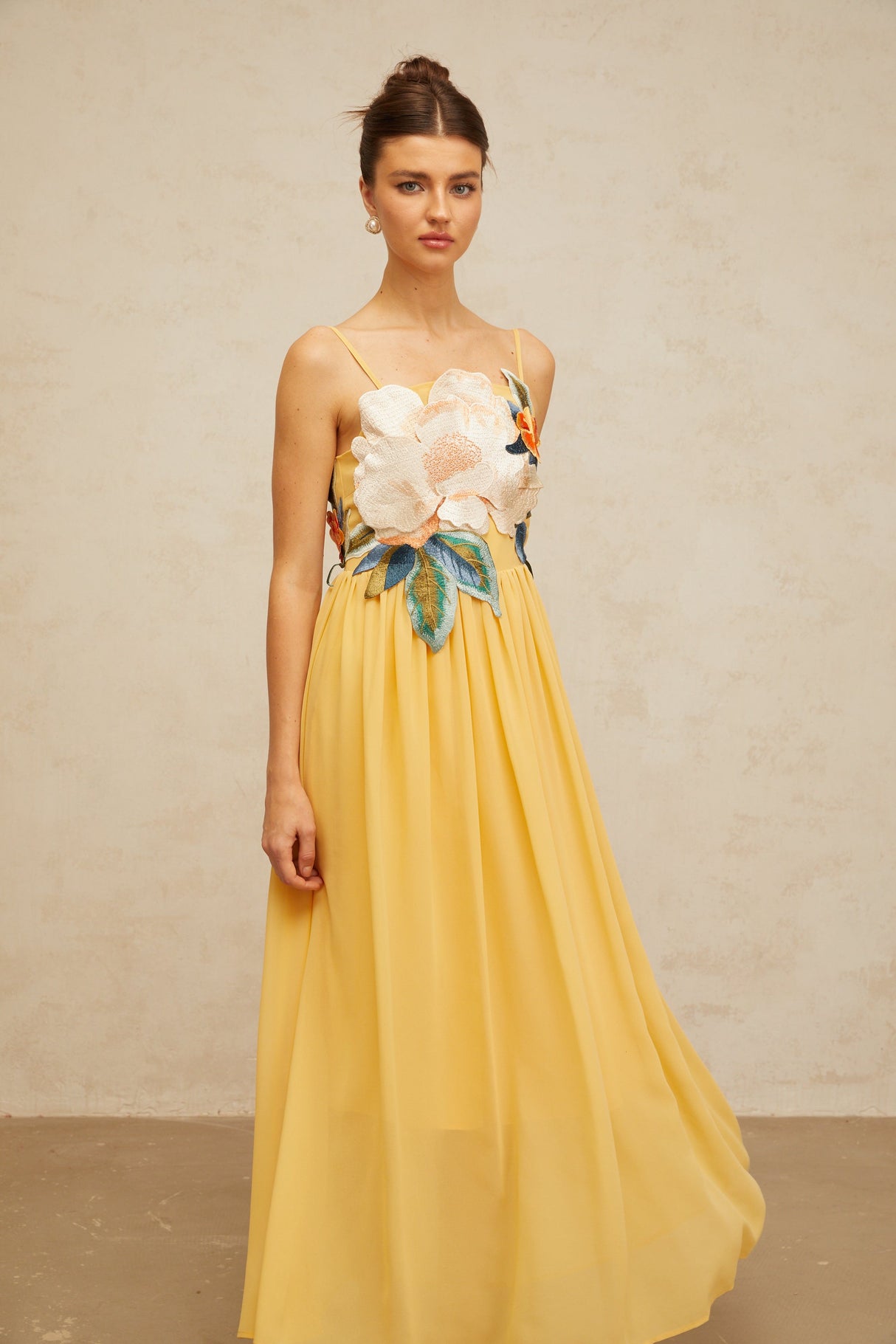 Aurohaya Josette floral-embroidered shirred maxi dress in Yellow