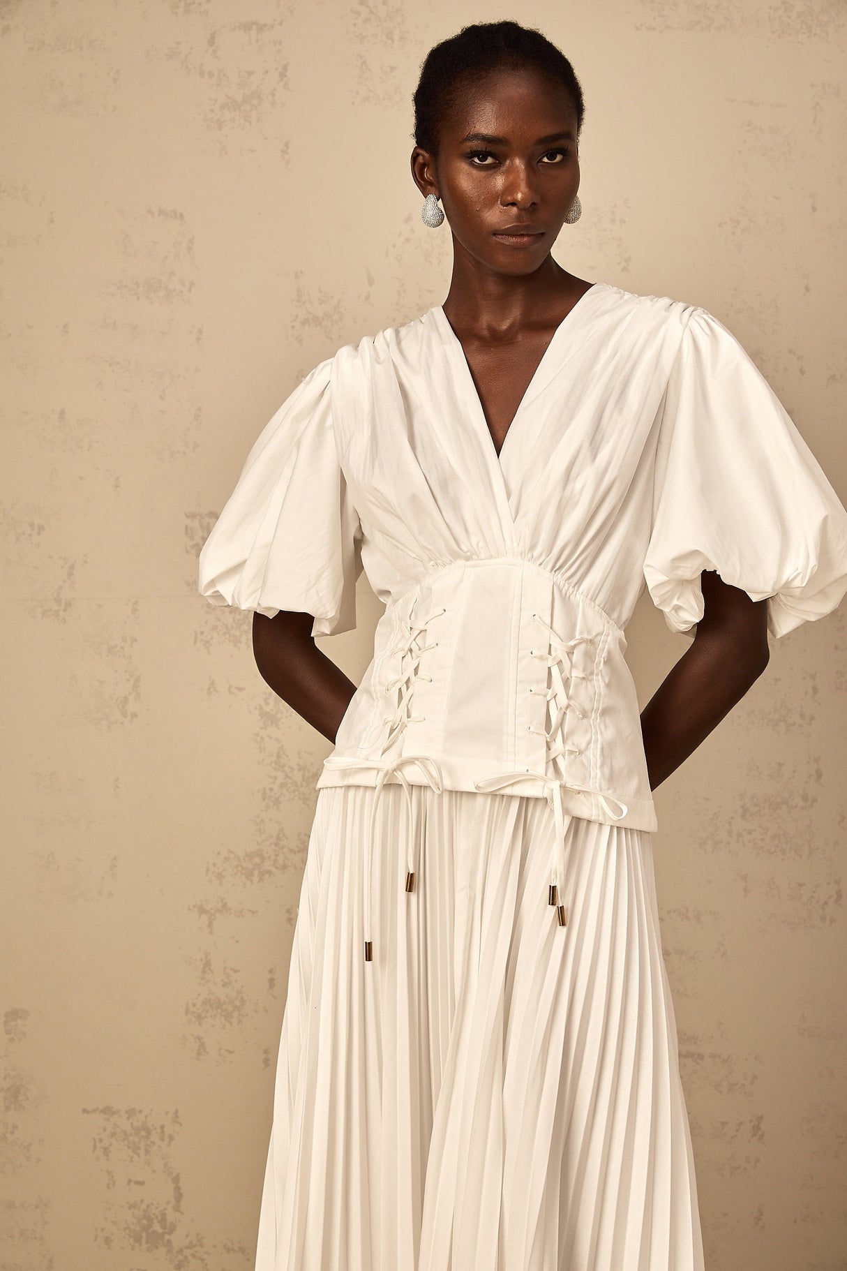 Aurohaya Vienne White Lace-Up Pleated Maxi Dress