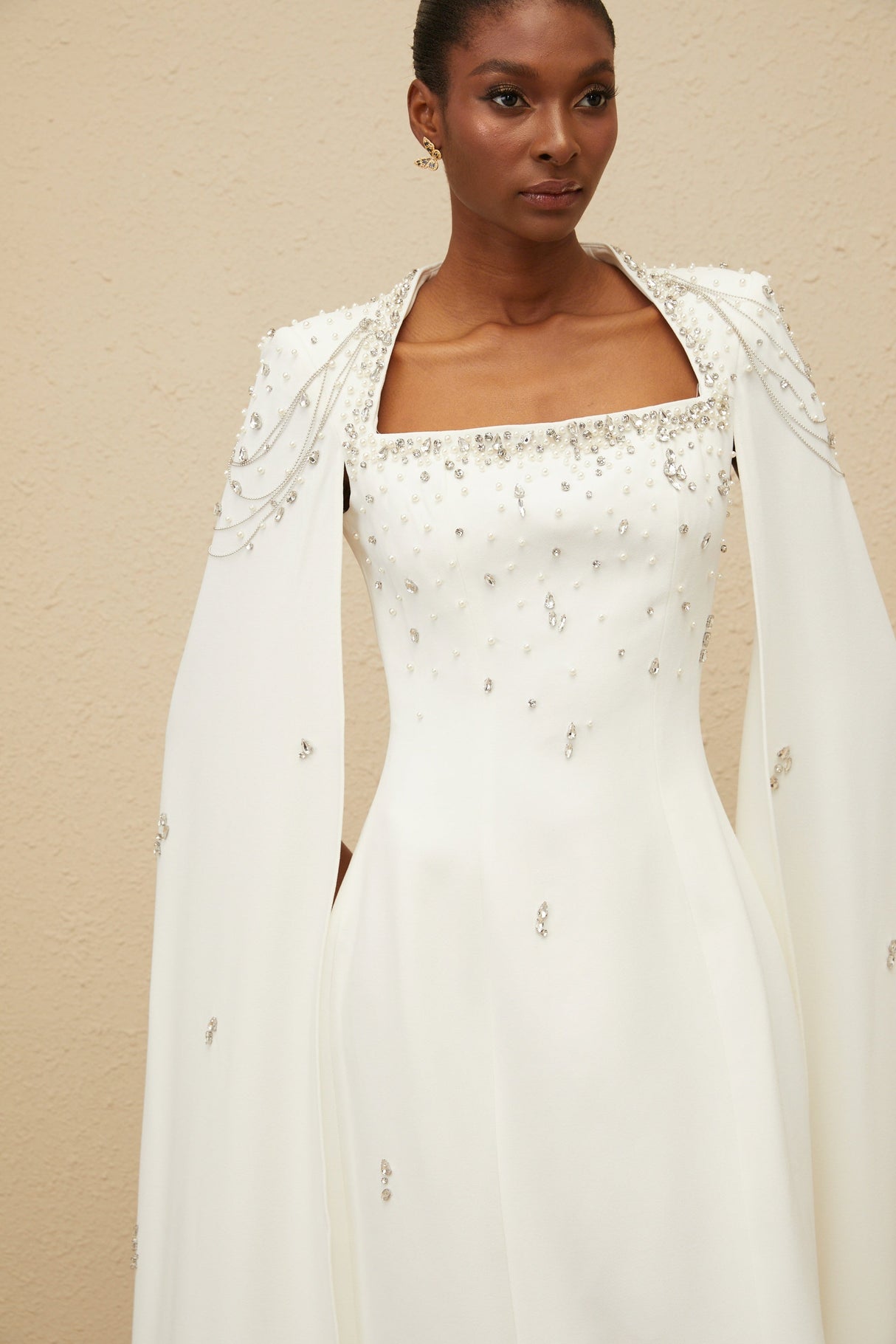 Aurohaya Épuré White Embellished Cape Gown