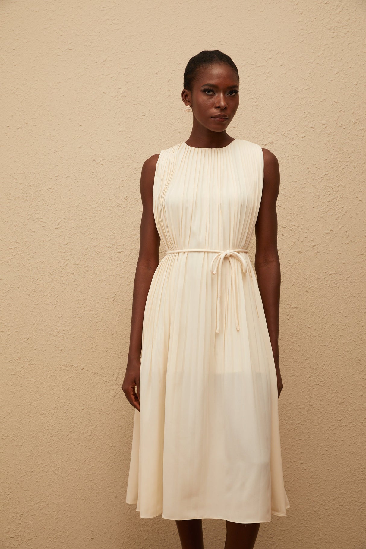 Aurohaya Célestine Neutral Sleeveless Pleated Midi Dress