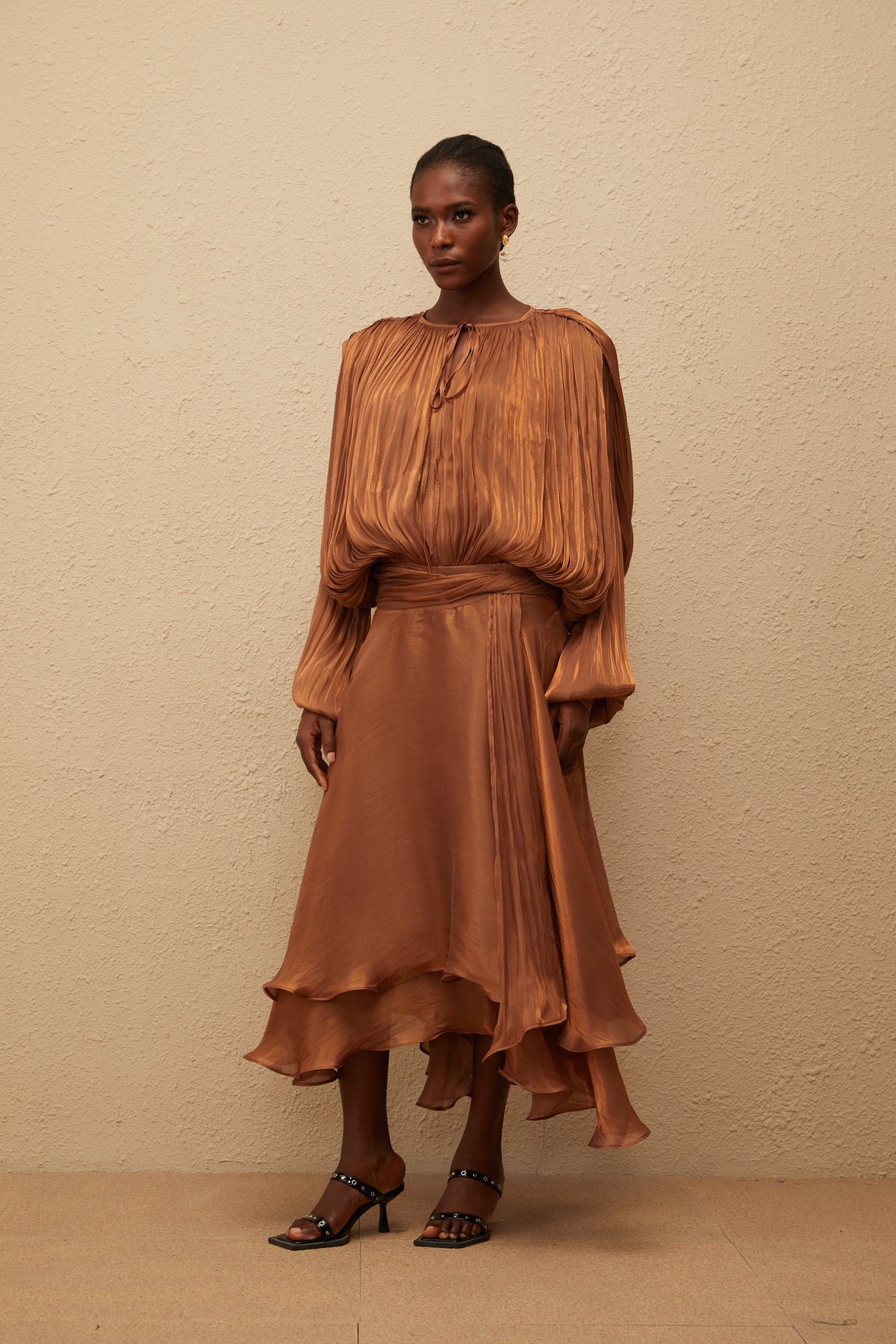 Aurohaya Eugénie Pleated Ruffle Maxi Dress in Brown