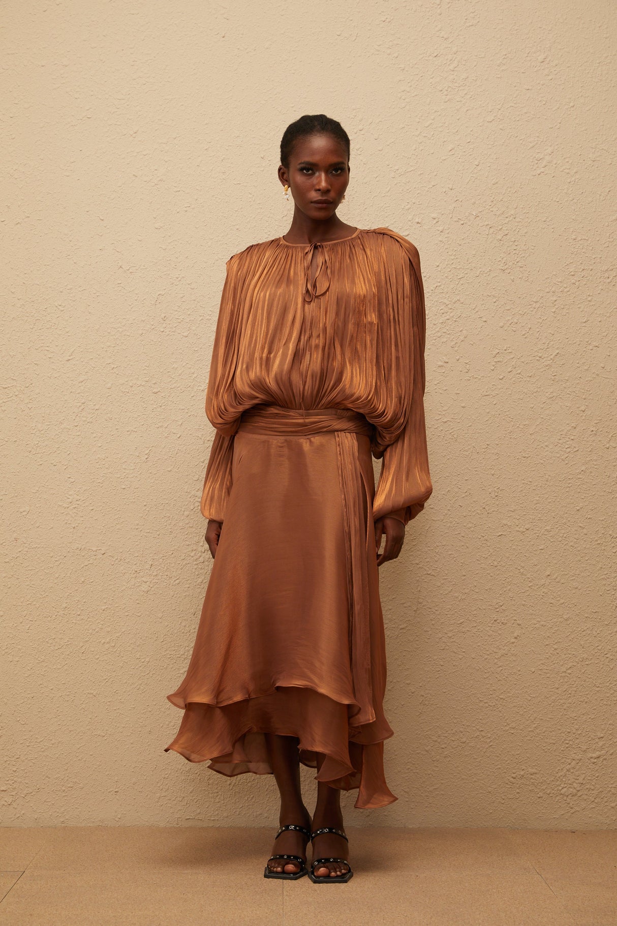 Aurohaya Eugénie Pleated Ruffle Maxi Dress in Brown