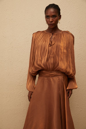 Aurohaya Eugénie Pleated Ruffle Maxi Dress in Brown