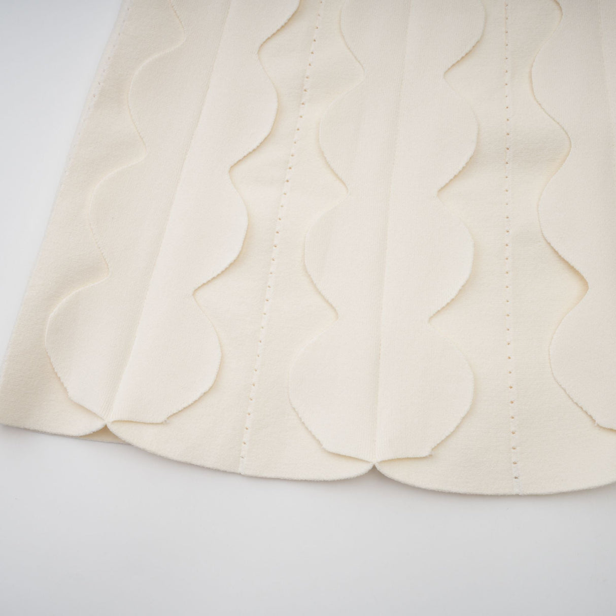 Aurohaya Axelle white wavy-detail sleeveless mini dress