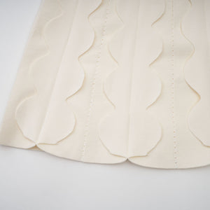 Aurohaya Axelle white wavy-detail sleeveless mini dress