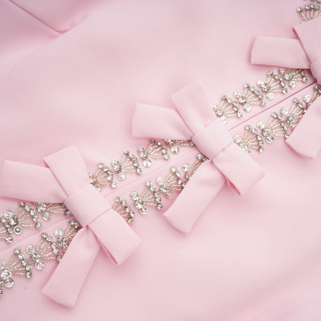 Aurohaya Cassi crystal-accented pink bow midi dress