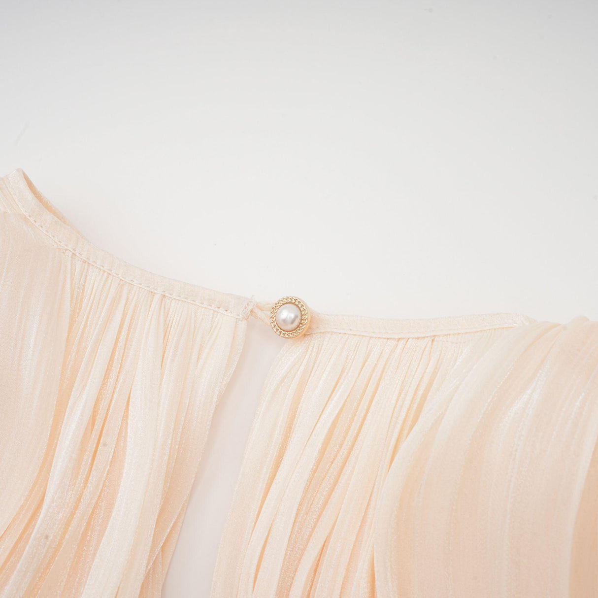 Aurohaya Eugénie Neutral Fully Pleated Ruffled Mini Dress