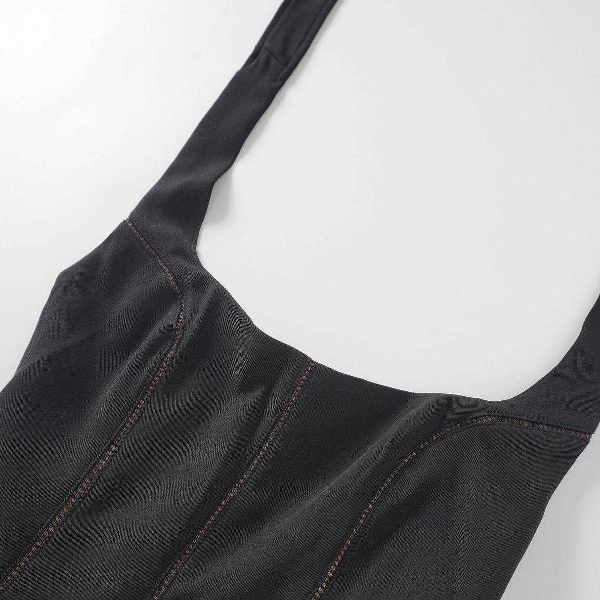 Aurohaya Quirine halterneck bow-detail mini dress in Black
