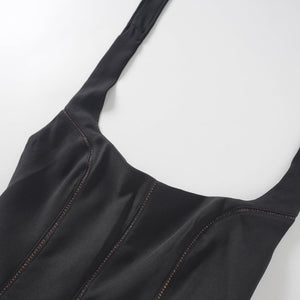 Aurohaya Quirine halterneck bow-detail mini dress in Black