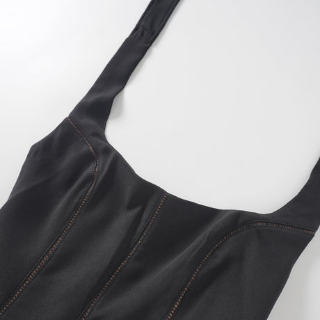 Aurohaya Quirine halterneck bow-detail mini dress in Black