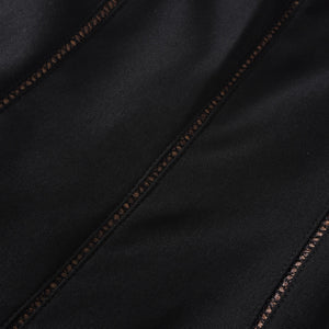 Aurohaya Quirine halterneck bow-detail mini dress in Black