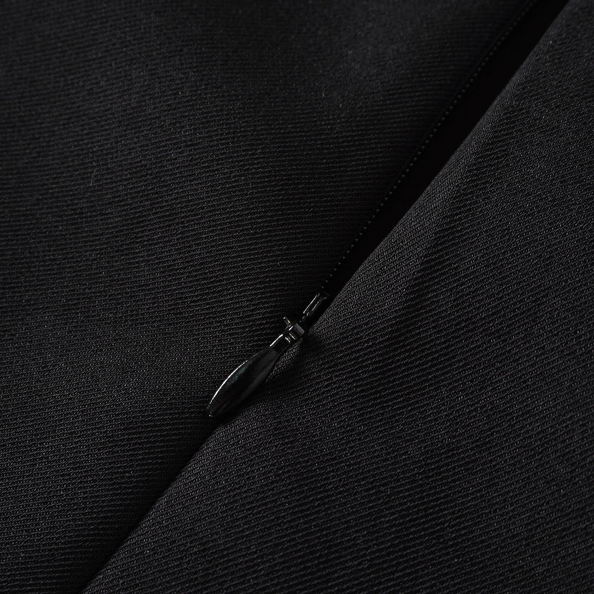 Aurohaya Quirine halterneck bow-detail mini dress in Black
