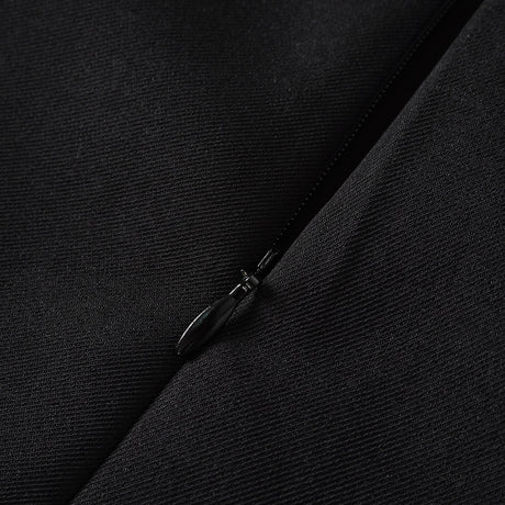 Aurohaya Quirine halterneck bow-detail mini dress in Black