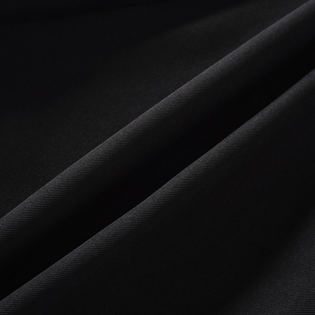 Aurohaya Quirine halterneck bow-detail mini dress in Black