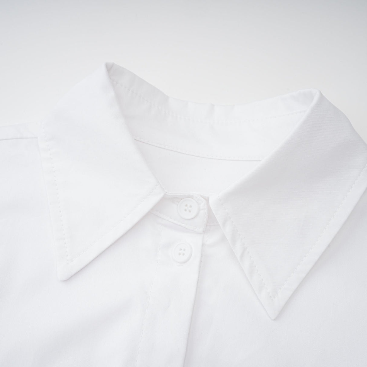 Aurohaya Dulcie white front-slit shirred shirt dress