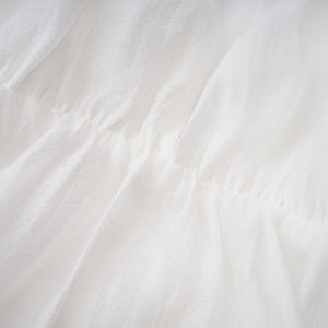 Aurohaya Quincie white shirred flounced mini dress