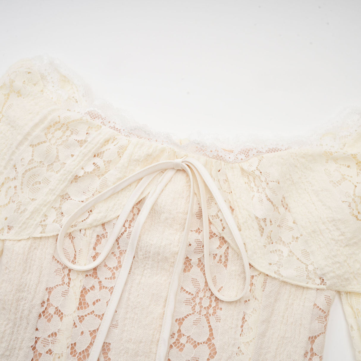 Aurohaya Émeline floral lace flared-cuff mini dress in Neutrals