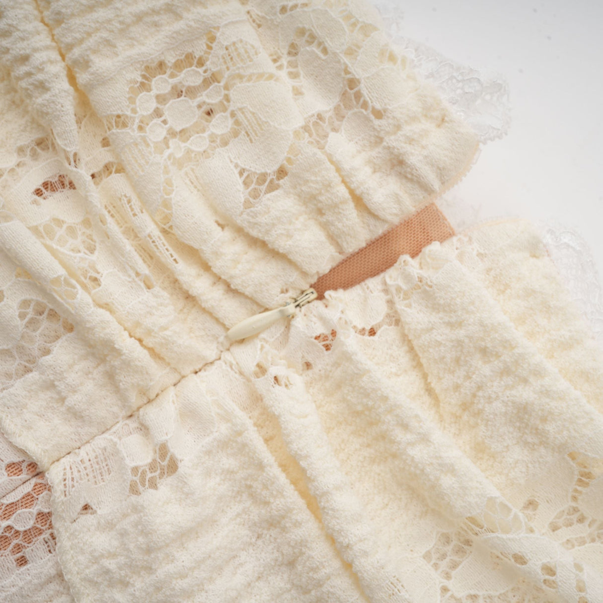 Aurohaya Émeline floral lace flared-cuff mini dress in Neutrals