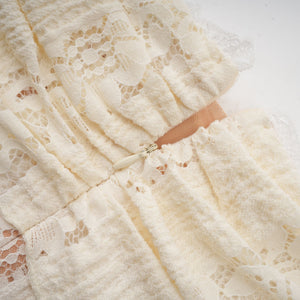 Aurohaya Émeline floral lace flared-cuff mini dress in Neutrals
