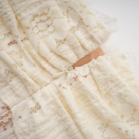 Aurohaya Émeline floral lace flared-cuff mini dress in Neutrals