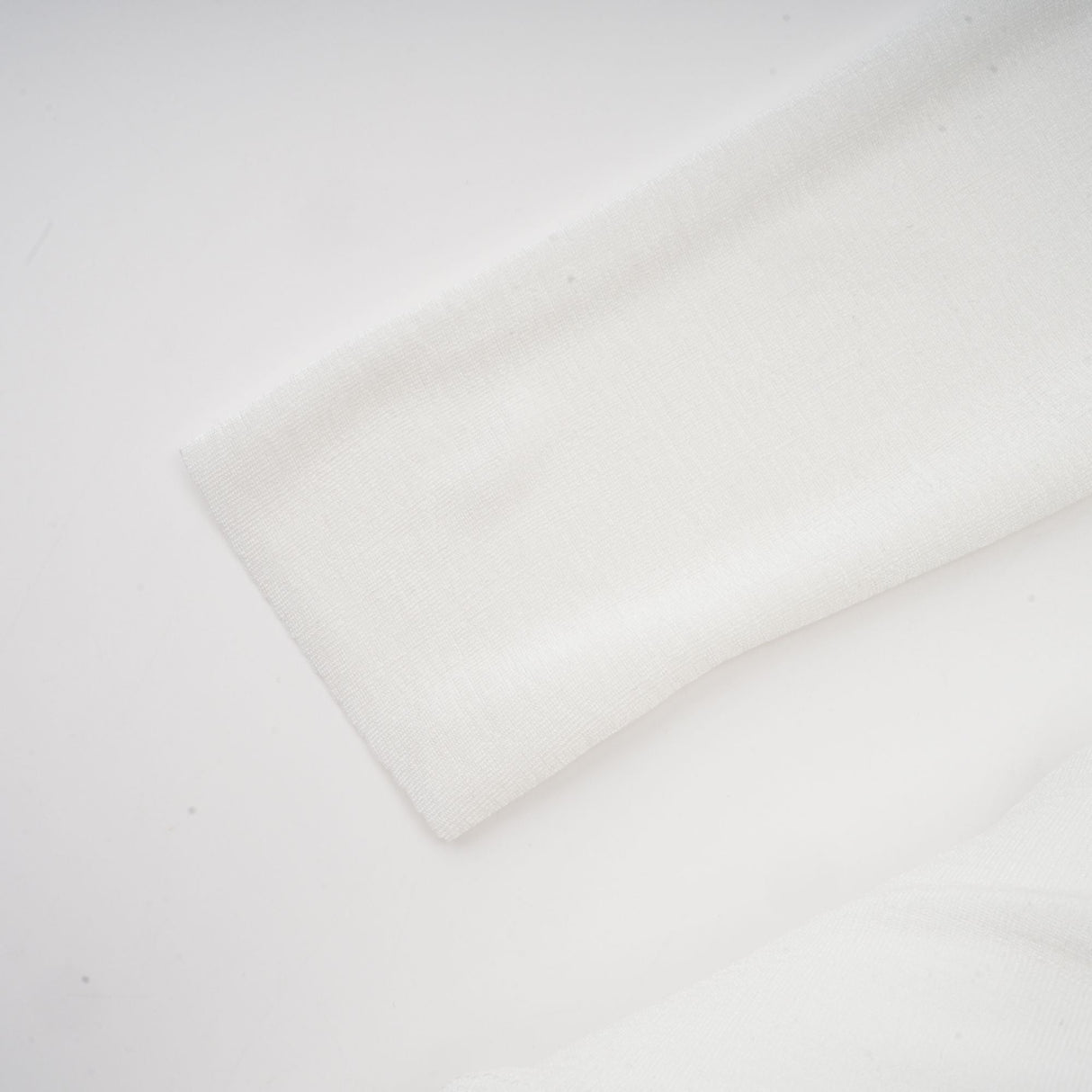 Aurohaya Noémie off-shoulder panelled maxi dress in White