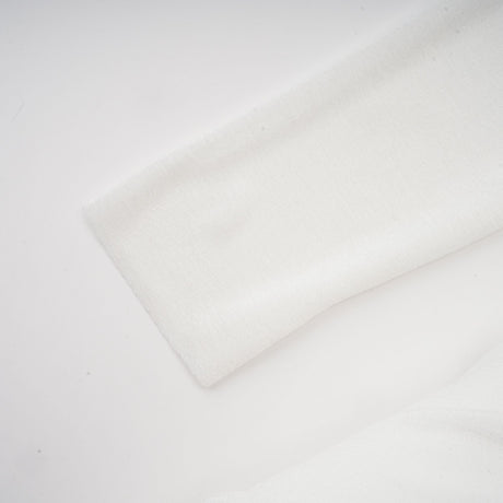 Aurohaya Noémie off-shoulder panelled maxi dress in White